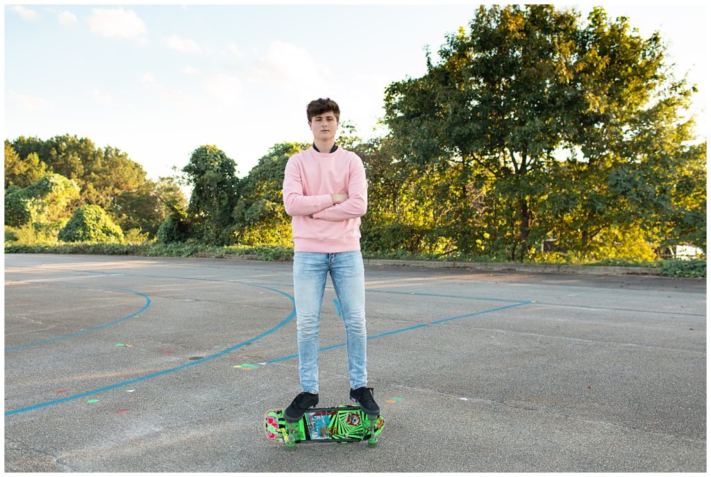 senior male balancing on skateboard